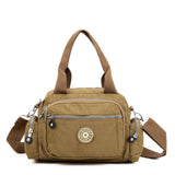 Dark Blue Dual-Use Sports Waist Handbag - Durable Canvas Material, Adjustable Shoulder Strap, Five Zip Pockets, and Easy-to-Clean Design