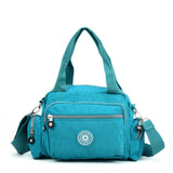 Dark Blue Dual-Use Sports Waist Handbag - Durable Canvas Material, Adjustable Shoulder Strap, Five Zip Pockets, and Easy-to-Clean Design